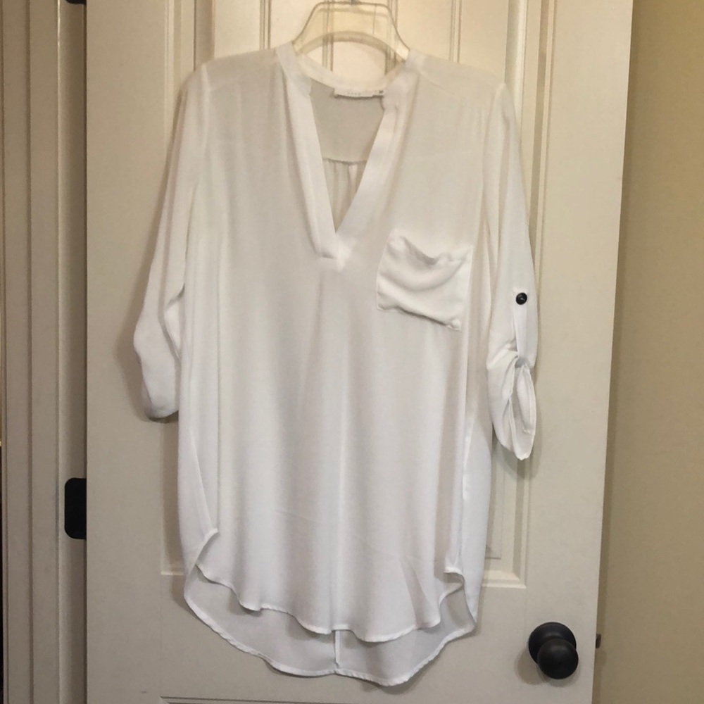 Lush tunic. White